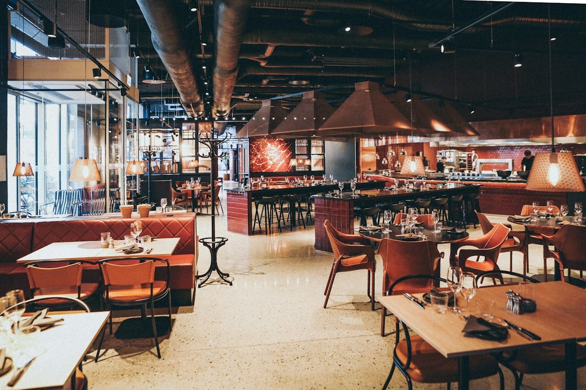 Cinematic luxury restaurant dining interior designed by Drishya Design