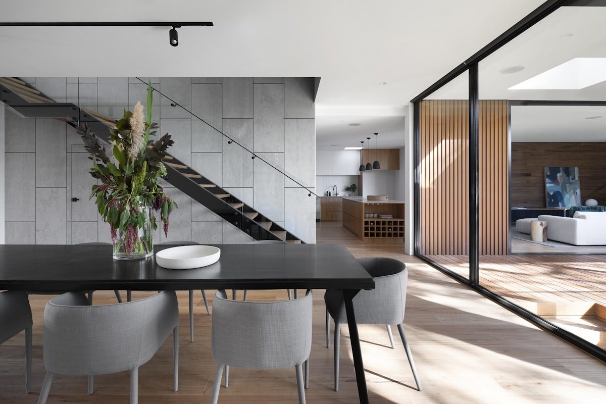 Warm contemporary family lounge interior designed by Drishya Design
